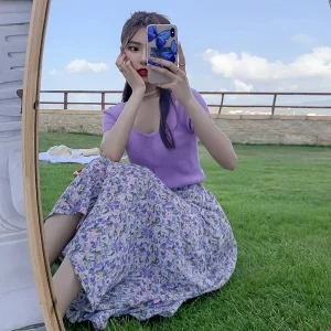 Minigonna profumata viola Fascia alta Elegante primavera estate Nuovi leggings a goccia a linea A Gonna versatile che copre la carne 1