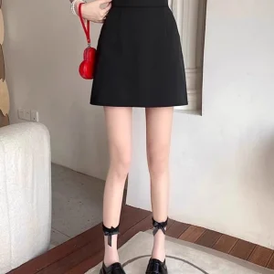 Minigonna a vita alta a linea A per donna Vendita calda primaverile della stagione Gonna corta elegante nera snellente Stile dolce fresco Pol.. 1