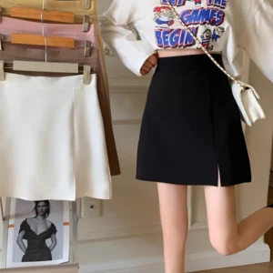 Minigonna nera a linea A Vendita calda primaverile da donna della stagione Gonna a vita alta con spacco Elegante contorno del corpo in poliestere Fa.. 1