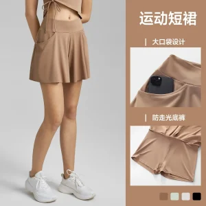 2025 Nuova gonna da tennis, finta da donna, due gonne antiluce, gonna sportiva con ampia tasca per dimagrire in primavera ed estate 1