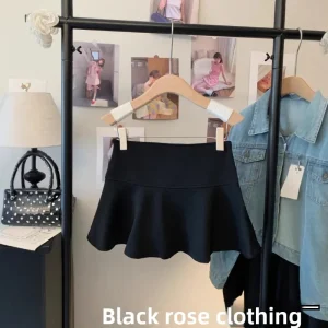 Gonna corta a vita alta Gonna corta a metà corpo tinta unita in fibra di poliestere stile coreano anti-luce da donna 1