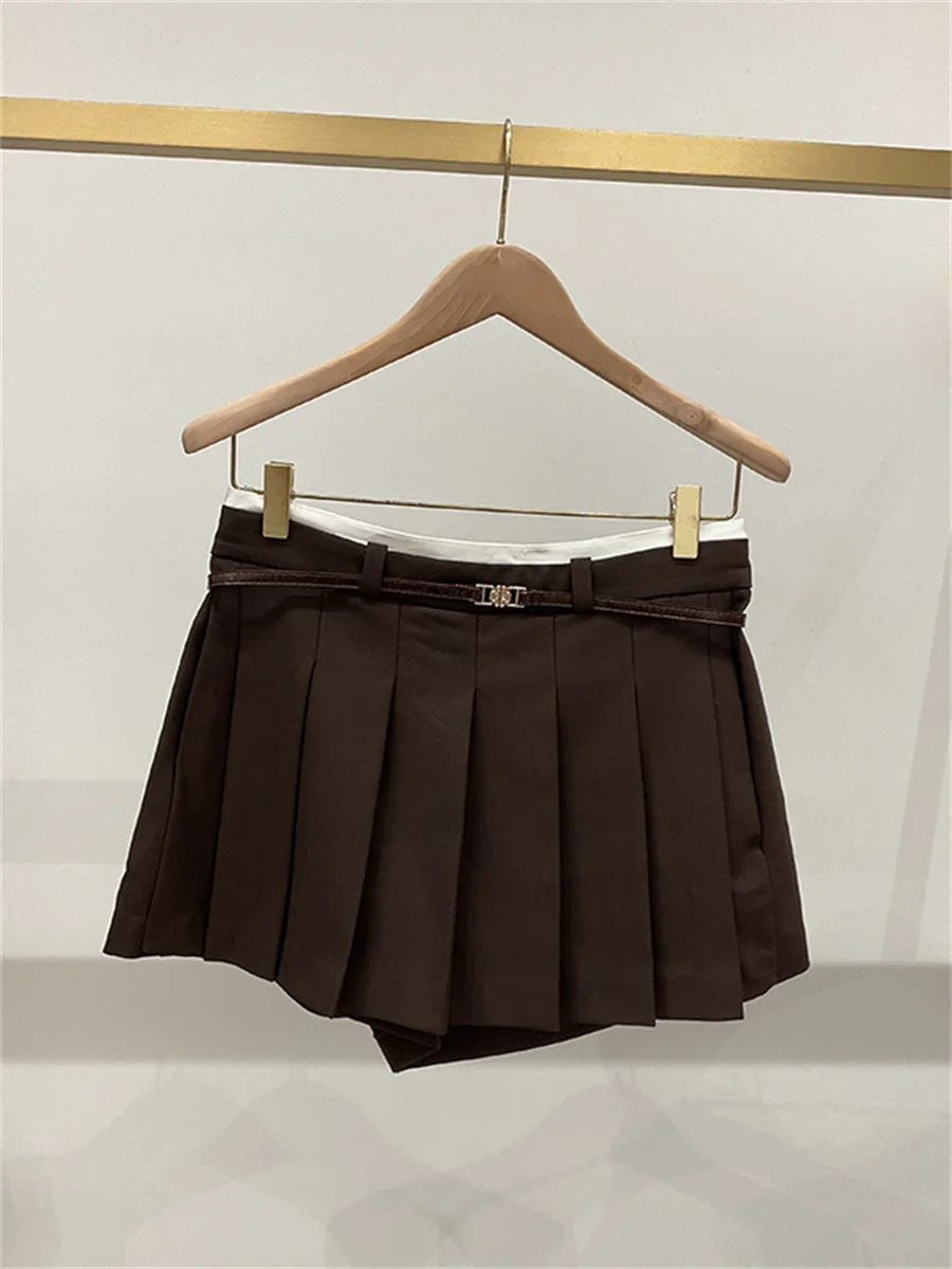 Gonna corta a trapezio in tinta unita Gonna corta da donna a pieghe a vita alta con fascia alla moda 2025 Autunno Nuovo tutto-fiammifero 1