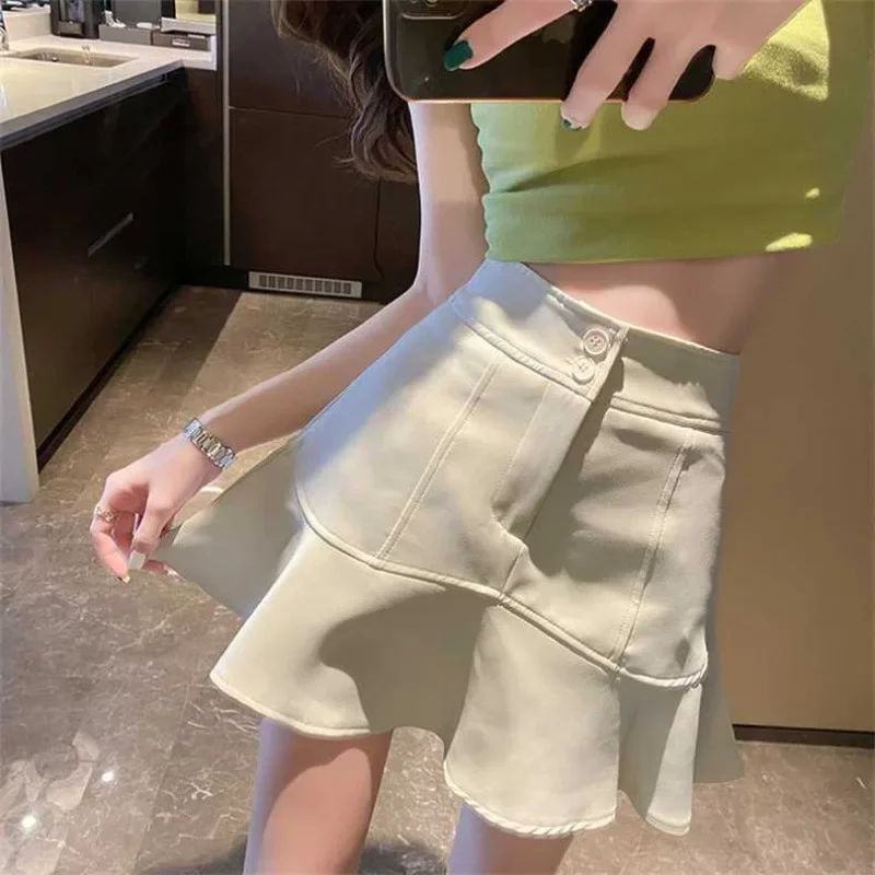 Minigonna a trapezio a vita alta taglie forti con design a coda di pesce Gonne a metà corpo dimagranti nuovo stile estivo per donna increspate 2