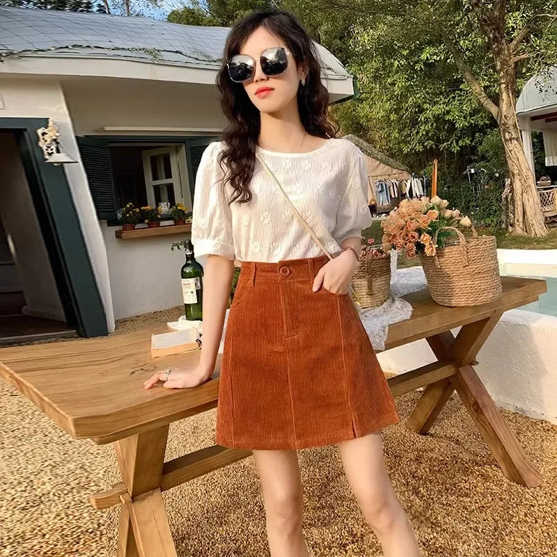 Minigonna a trapezio in velluto a coste viola stile Hong Kong Primavera Autunno da donna a vita alta dimagrante divisa semplice avvolgente aderente corto da sci 1