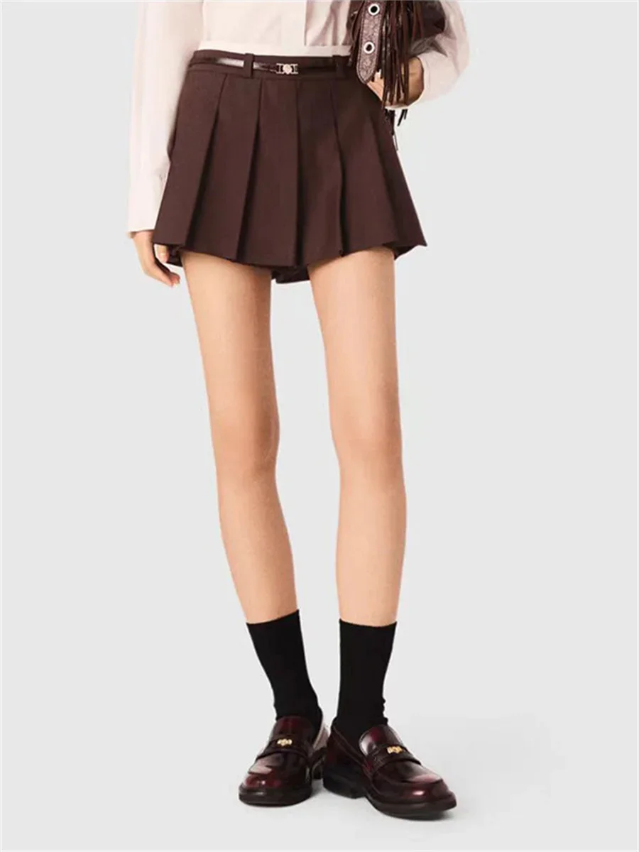 Gonna corta a trapezio in tinta unita Gonna corta da donna a pieghe a vita alta con fascia alla moda 2025 Autunno Nuovo tutto-fiammifero 2