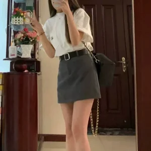 Minigonna a trapezio retrò a vita alta Minigonna aderente da donna Mezza lunghezza Estate Vendita calda della stagione Gonna sexy anti-esposizione Poliestere 1